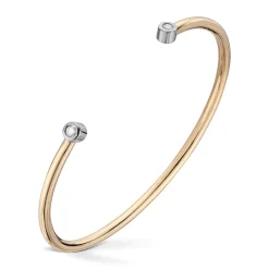 Diamonds by Frisenberg – Armring i gult gull med ender i hvitt gull og diamanter – 0,20 ct