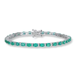 Diamonds by Frisenberg – Tennis armbånd i hvitt gull med diamanter og smaragder