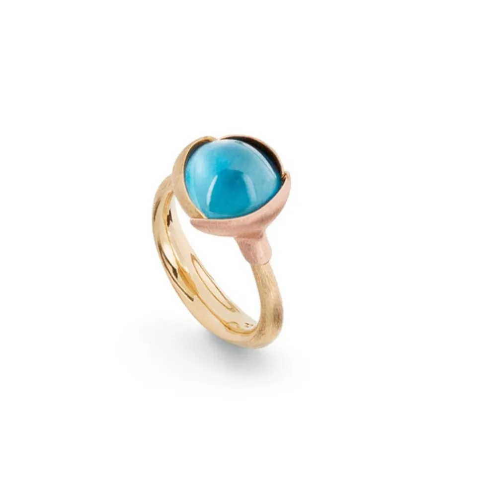 OLE LYNGGAARD COPENHAGEN – Lotus ring nr 2 i gult gull med sky blue topas
