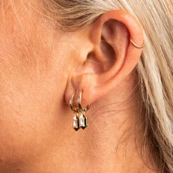 PAN Jewelry – Ørepynt i forgylt sølv med zirkonia, baguette