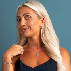 Pan Jewelry – Ørepynt i sølv med blå zirkonia