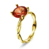 Pan Jewelry – Ring i gult gull med syntetisk padparascha, oransje