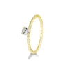 Saint Maurice – Tvunnet Ring I Gult Gull Med Diamant 0,20 ct